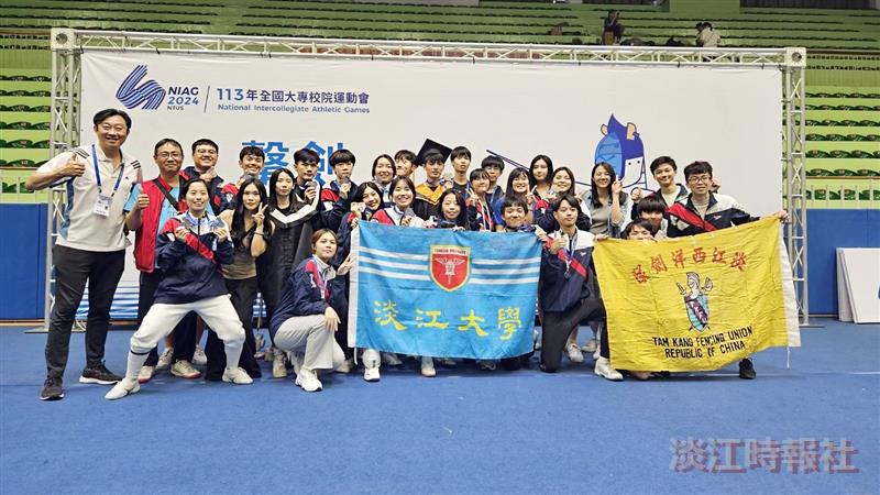 The Fencing Team takes a joyful group photo after the competition at the National Intercollegiate Athletic Games.