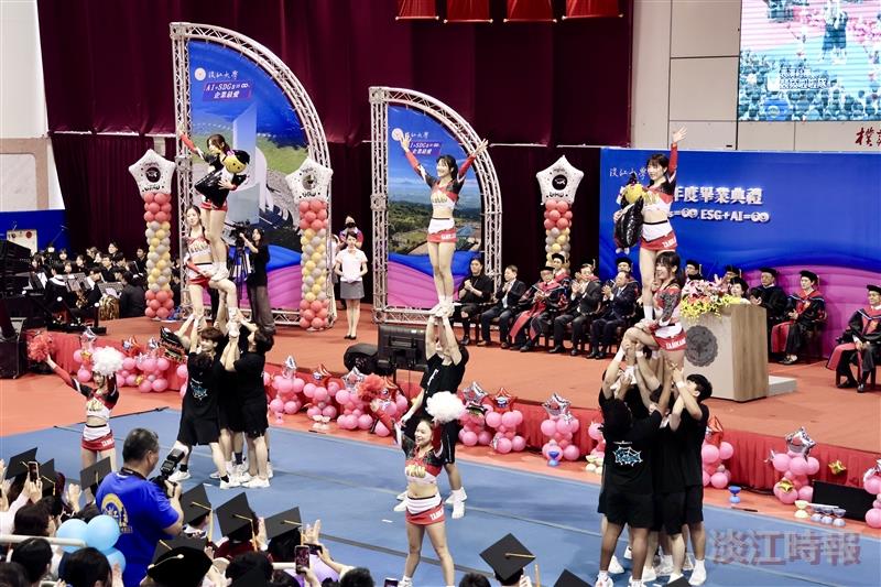 The commencement ceremony began with a spectacular performance by the competitive cheerleading team.