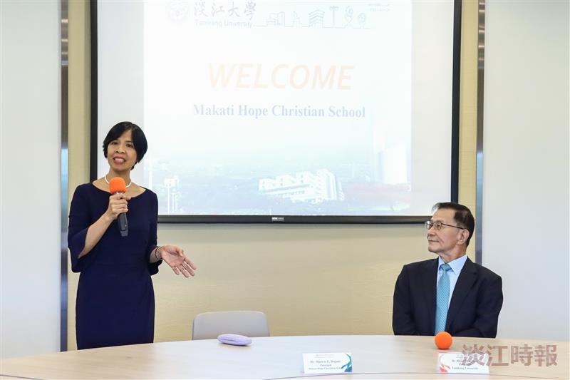 Dr. Marivic L. Daguio (left), Principal of Makati Hope Christian School, delivers a speech.