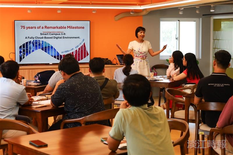 with participants joyfully posing for a group photo.
