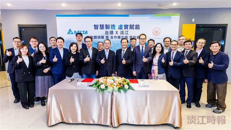 Group photo of representatives from both sides following the donation and signing ceremony.