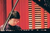 年輕音樂家陳世偉，演奏貝多芬、蕭邦、李斯特等大師的作品，讓聽眾如痴如醉。（圖�王文彥）