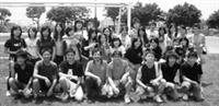 96年西語系足球教學競賽，開始先介紹足球規則，接著進行足球賽，藉此讓本校外籍生與本系學生交流。系上教授白方濟（前左四）與學生踢足球同樂。（圖�西班牙語文學系提供）