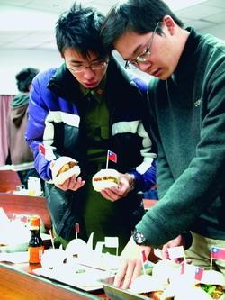Students are seen making sandwiches to learn history.