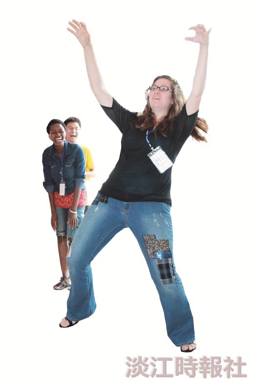 Foreign students enjoy themselves while playing Charades.