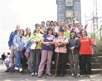 員福會率167人暖壽登觀音山
