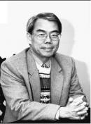 台灣綜合研究院副院長吳再益自民國62年考進淡江統計系至今，從學生的角色轉換為老師，提攜後進不遺餘力。（洪翎凱攝影）
