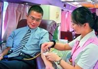 長期響應捐血活動的童軍團指導老師黃文智說：「希望大家都能當個快樂的捐血人。（攝影�曾煥元）